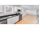 Well-equipped kitchen with granite countertops, modern appliances, and an open layout at 2001 Tyvola Rd, Charlotte, NC 28210