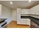 Kitchen with granite countertops, white cabinets, and stainless steel appliances at 2001 Tyvola Rd, Charlotte, NC 28210