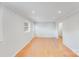 Open living area with hardwood floors, neutral paint, and recessed lighting for a modern touch at 2001 Tyvola Rd, Charlotte, NC 28210