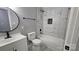 Updated bathroom with modern black fixtures, a tiled shower/bath, and stylish sink at 2203 Arney St, Lincolnton, NC 28092