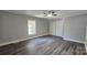 Spacious bedroom with a ceiling fan, natural light, and a closet with ample space at 2203 Arney St, Lincolnton, NC 28092