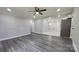 Open concept living room with wood-look floors and neutral color palette at 2203 Arney St, Lincolnton, NC 28092
