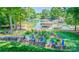 Lakefront backyard featuring a lush garden, multiple boat docks and storage, and scenic water views at 2580 Penngate Dr, Sherrills Ford, NC 28673