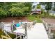 Waterfront backyard with a dock perfect for entertaining and lake access to home with backyard stairs at 2580 Penngate Dr, Sherrills Ford, NC 28673