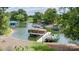 Picturesque lakefront backyard with a private dock and various boat storage and lounging platforms at 2580 Penngate Dr, Sherrills Ford, NC 28673