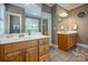 Bathroom features double vanities with tiled flooring at 2580 Penngate Dr, Sherrills Ford, NC 28673