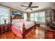 Cozy bedroom with hardwood floors, large windows, and classic furnishings at 2580 Penngate Dr, Sherrills Ford, NC 28673