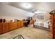 Large bedroom featuring neutral carpet, vaulted ceiling and ample built-in storage at 2580 Penngate Dr, Sherrills Ford, NC 28673