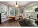 Bright breakfast nook with large windows, granite countertop and tiled flooring at 2580 Penngate Dr, Sherrills Ford, NC 28673