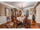 Formal dining room featuring elegant furnishings, hardwood floors, and classic chandelier at 2580 Penngate Dr, Sherrills Ford, NC 28673