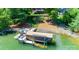 Dock with a boat lift and jet ski cover at 2580 Penngate Dr, Sherrills Ford, NC 28673