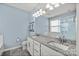 Primary bathroom showcasing a dual sink vanity with granite counters, industrial shelving, and a glass enclosed shower at 2830 Berkhamstead Cir, Concord, NC 28027