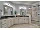 Stylish bathroom featuring double sink vanity, quartz countertop, and a glass door shower at 298 Horton Grove Rd, Fort Mill, SC 29715