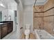 Bathroom showcasing a tile surround shower, toilet, vanity and tile floor at 298 Horton Grove Rd, Fort Mill, SC 29715