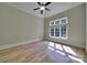 Bright, vacant bedroom with large window and hardwood floors at 298 Horton Grove Rd, Fort Mill, SC 29715