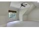 A bedroom with wall to wall carpet, a ceiling fan, and a large window at 298 Horton Grove Rd, Fort Mill, SC 29715