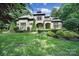 Stunning stone and stucco home with manicured lawn and mature trees at 298 Horton Grove Rd, Fort Mill, SC 29715