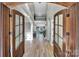 Grand foyer showcasing hardwood floors, high ceilings, and staircase at 298 Horton Grove Rd, Fort Mill, SC 29715
