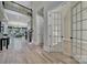 Bright foyer with hardwood floors, iron railing, and view of living area at 298 Horton Grove Rd, Fort Mill, SC 29715
