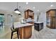 Gourmet kitchen featuring a central island, stainless steel appliances, and hardwood floors at 298 Horton Grove Rd, Fort Mill, SC 29715