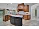 Open kitchen featuring a central island, stainless steel appliances, and hardwood floors at 298 Horton Grove Rd, Fort Mill, SC 29715