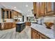 Stunning kitchen with stainless appliances, a central island, and ample wood cabinetry at 298 Horton Grove Rd, Fort Mill, SC 29715