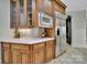 Gourmet kitchen area with stainless steel appliances, wood cabinetry, and quartz countertops at 298 Horton Grove Rd, Fort Mill, SC 29715