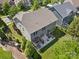 An aerial view of the home showcasing its backyard patio, pergola, landscaping, and position in the neighborhood at 300 Hidden Cove Ln, Matthews, NC 28104
