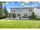 Large backyard with a patio, pergola, and well-maintained lawn, perfect for outdoor activities and relaxation at 300 Hidden Cove Ln, Matthews, NC 28104