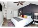 Bright bedroom with a king bed, adjacent bathroom, and modern decor elements for a cozy and inviting space at 300 W 5Th St # 644, Charlotte, NC 28202