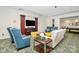 Comfortable common area with stylish seating, entertainment center, and ample natural light at 300 W 5Th St # 644, Charlotte, NC 28202