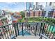 Balcony with views of the pool and community, offering a relaxing outdoor space in an urban setting at 300 W 5Th St # 644, Charlotte, NC 28202