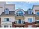 Beautiful condo building with arched windows, balconies, brick accents and a view of the sky at 300 W 5Th St # 644, Charlotte, NC 28202