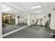Well-equipped fitness center with weight machines, stationary bikes, treadmills, and a mirrored wall at 300 W 5Th St # 644, Charlotte, NC 28202