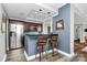 Modern kitchen with stainless steel appliances and dark wood cabinetry at 300 W 5Th St # 644, Charlotte, NC 28202