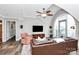 Open living room featuring hardwood floors and large windows at 300 W 5Th St # 644, Charlotte, NC 28202