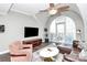 Open concept living room with hardwood floors and a large window at 300 W 5Th St # 644, Charlotte, NC 28202