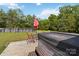 Backyard with a deck, outdoor seating, a pool, and lush greenery at 3401 Shillinglaw Rd, Sharon, SC 29742