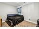 Simple carpeted bedroom with minimal furniture and a window with dark curtains at 3401 Shillinglaw Rd, Sharon, SC 29742