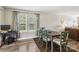 Dining area featuring sleek floors, a dining table, and large windows at 3401 Shillinglaw Rd, Sharon, SC 29742