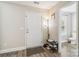 Entryway with wood-look flooring, shoe rack, and view into a bathroom at 3401 Shillinglaw Rd, Sharon, SC 29742