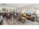 Open-concept living room with sleek flooring, comfortable furniture, and natural light at 3401 Shillinglaw Rd, Sharon, SC 29742