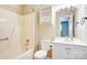 Full bathroom with tub and shower, white vanity and toilet, and storage cabinet at 3455 Hickory Pl, Salisbury, NC 28144