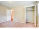 Bedroom featuring neutral walls, closet, and carpet; bathroom access at 3455 Hickory Pl, Salisbury, NC 28144