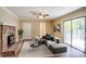 Inviting living room with fireplace, comfortable seating, and sliding glass doors at 3455 Hickory Pl, Salisbury, NC 28144