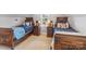 Bedroom featuring well-maintained, matching wood twin beds and nightstands at 423 State St, Charlotte, NC 28208