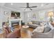 Cozy living room with a fireplace, comfortable seating, and bright, natural light at 423 State St, Charlotte, NC 28208