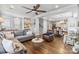 Spacious living room flowing into a dining area, featuring hardwood floors and ample natural light at 423 State St, Charlotte, NC 28208