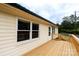 Inviting wooden deck providing a perfect spot for outdoor relaxation and enjoying the picturesque neighborhood views at 462 Berry Hill Dr, Norwood, NC 28128