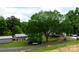 Picturesque community with mature trees and well-maintained homes, offering a serene and inviting atmosphere at 462 Berry Hill Dr, Norwood, NC 28128